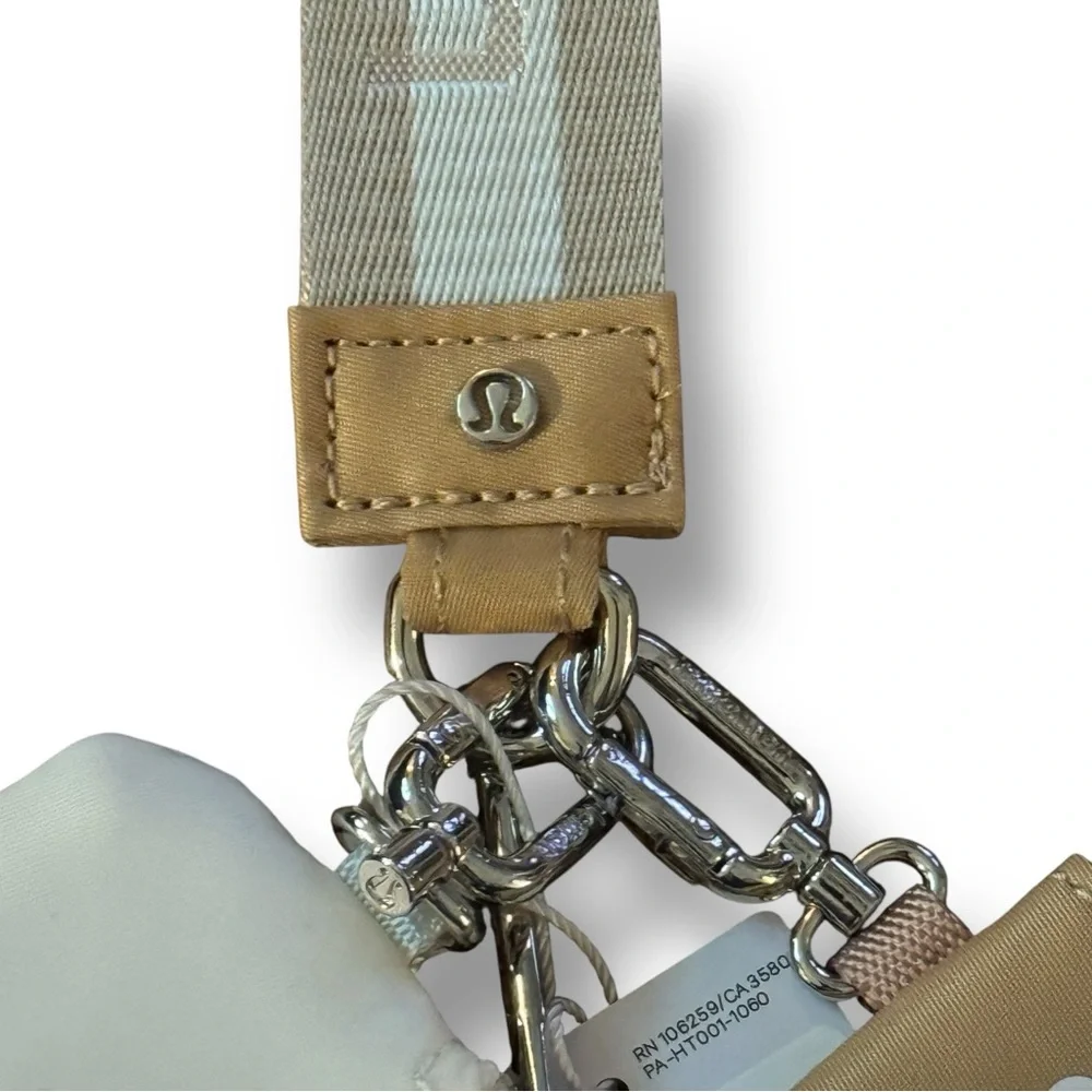 NWT Lululemon Dual Pouch Wristlet Bone/Movt O/S NWT Rare Brown Tan Cream Bone - Picture 4 of 10